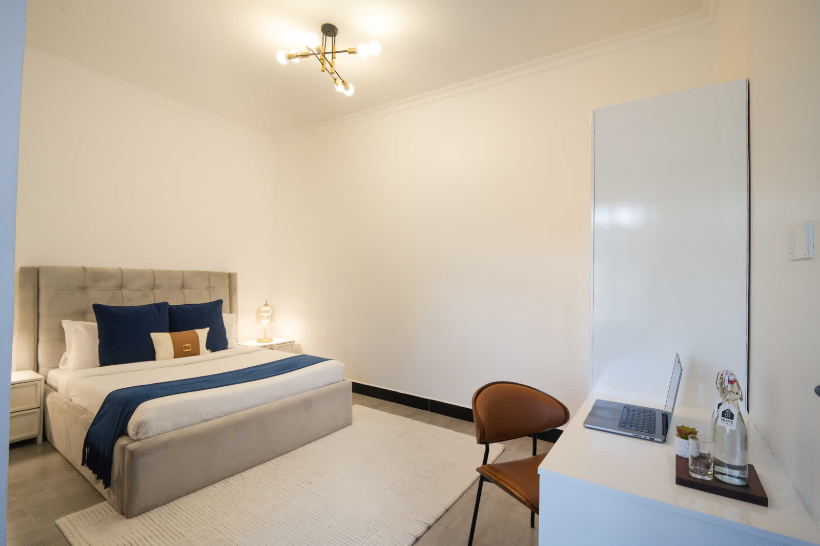 Blue Sapphire apartment bedroom workspace
