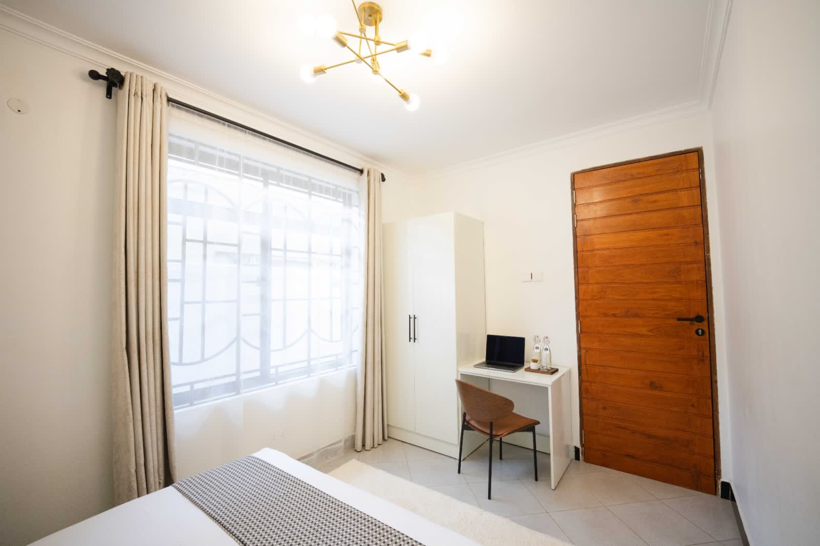 Emerald apartment bedroom workspace